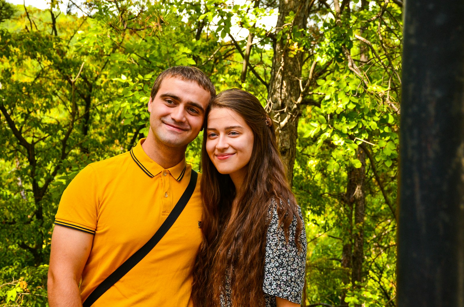 a man and a woman standing next to each other